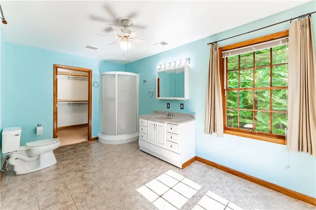 a view of kitchen with furniture and large window