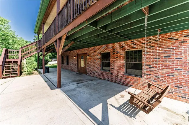 a view of balcony with wooden floor