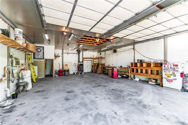 a backyard of a house with a fountain