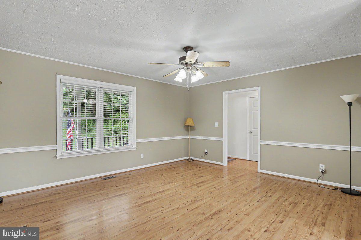543 Whiskey Still Road Linden, VA 22642 - Photo 8 of 23 a view of an empty room with a window