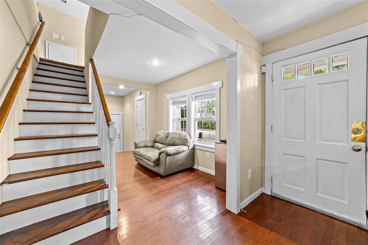 407 Brooks Avenue Raleigh, NC 27607 - Photo 13 of 30 a view of entryway with livingroom and stairs