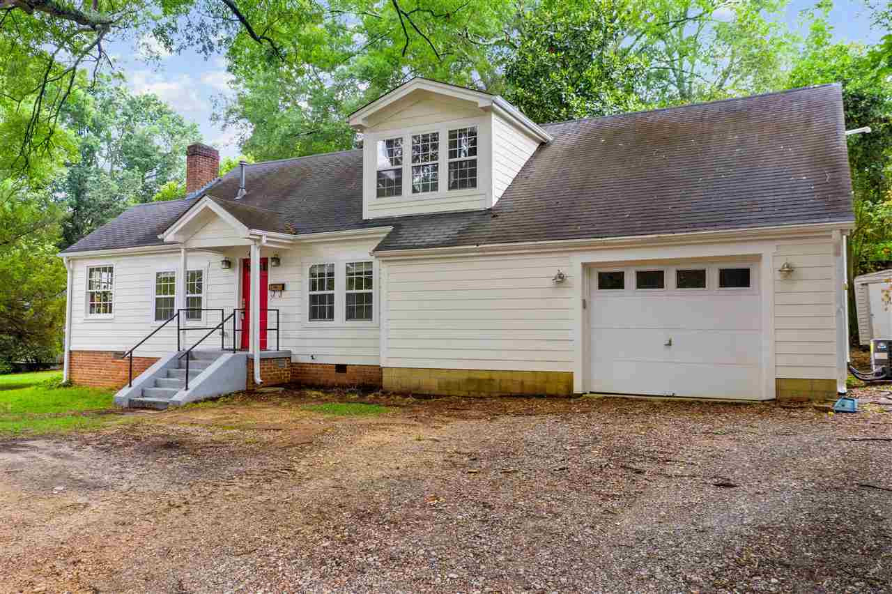 407 Brooks Avenue Raleigh, NC 27607 - Photo 2 of 30 a front view of a house with a yard