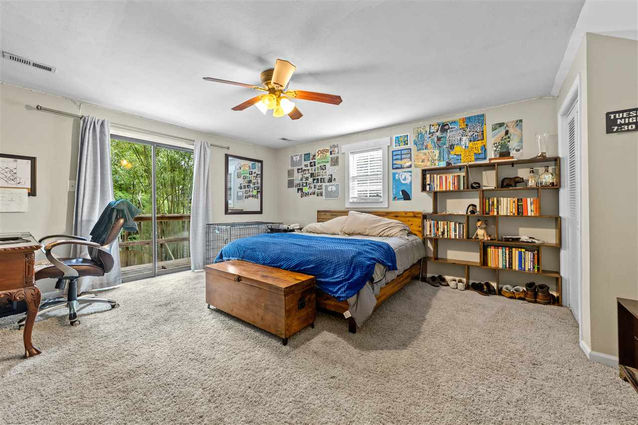 407 Brooks Avenue Raleigh, NC 27607 - Photo 25 of 30 a bedroom with a bed furniture and a window