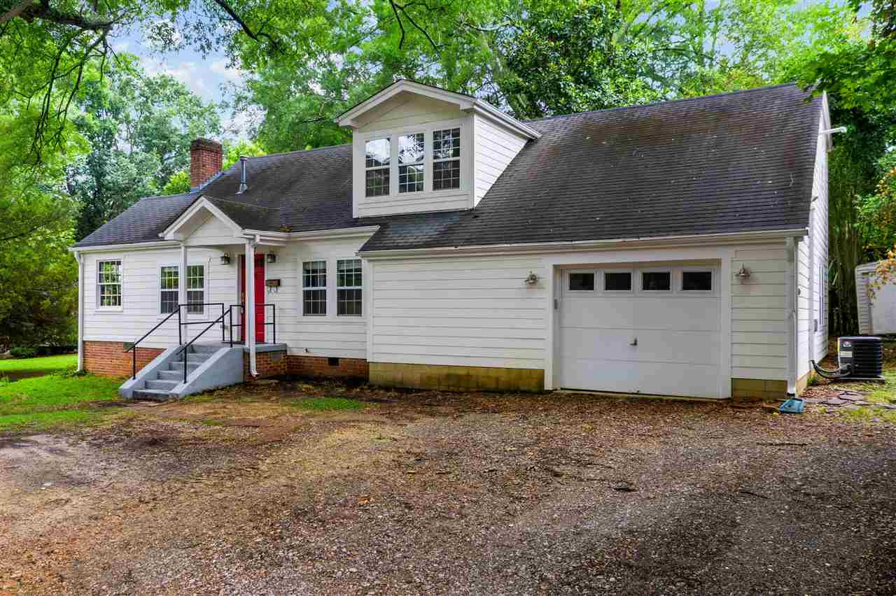 407 Brooks Avenue Raleigh, NC 27607 - Photo 4 of 30 a front view of a house with a yard