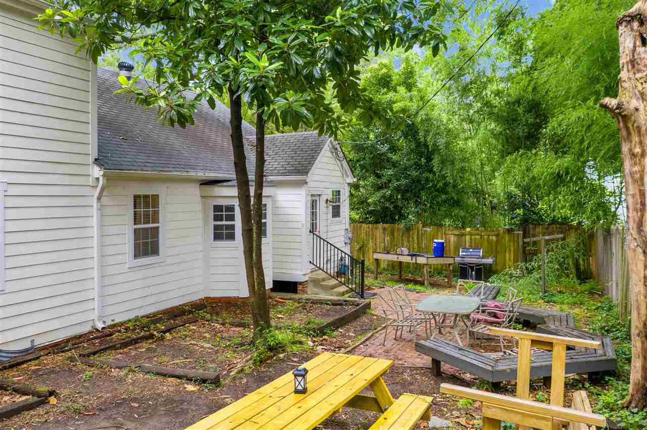 407 Brooks Avenue Raleigh, NC 27607 - Photo 5 of 30 a backyard of a house with seating space