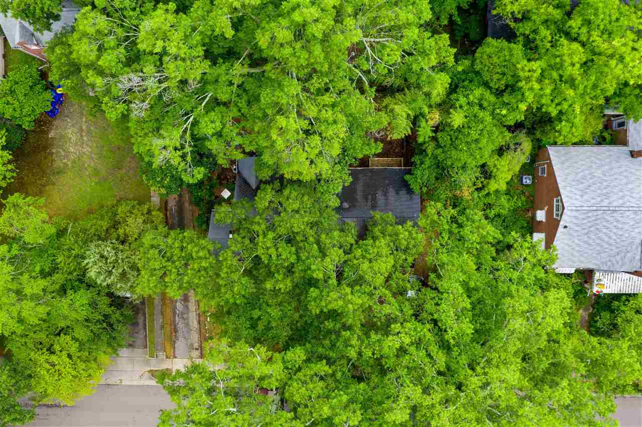 407 Brooks Avenue Raleigh, NC 27607 - Photo 8 of 30 an aerial view of a house with a yard
