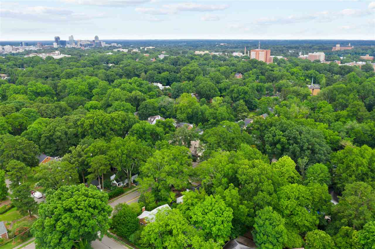 407 Brooks Avenue Raleigh, NC 27607 - Photo 9 of 30 an aerial view of a house with a yard