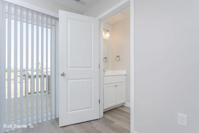 a view of front door with a sink