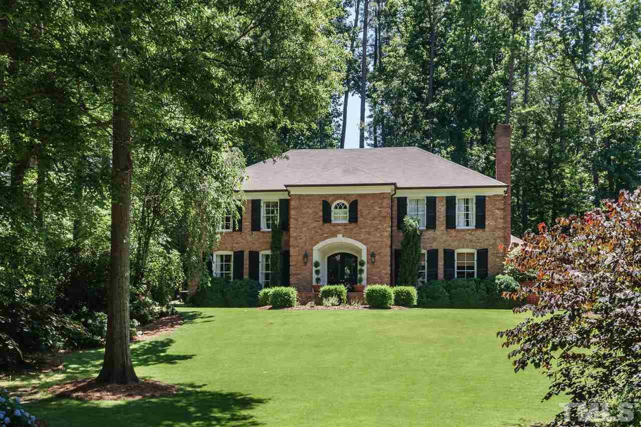 3300 Landor Road Raleigh, NC 27609 - Photo 1 of 25 a front view of a house with garden