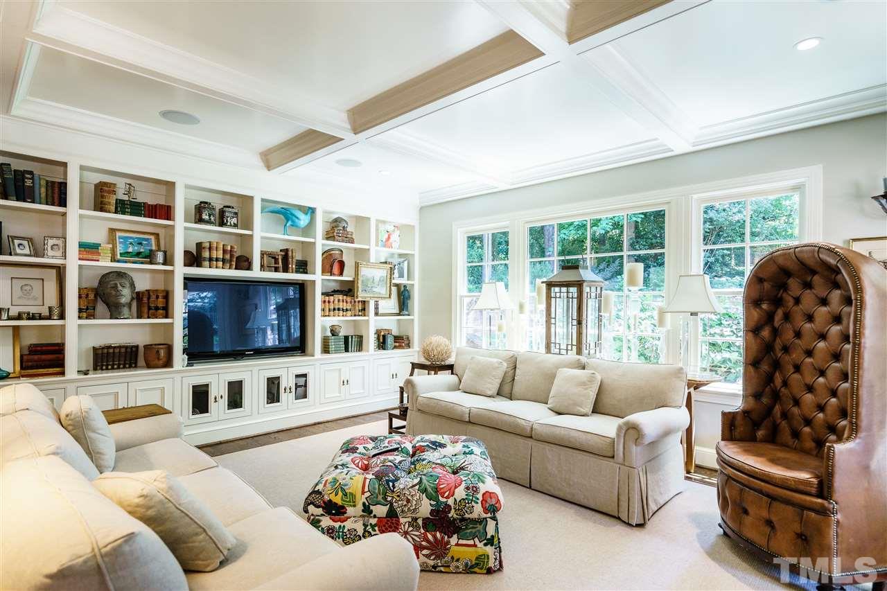 3300 Landor Road Raleigh, NC 27609 - Photo 12 of 25 a living room with furniture and a flat screen tv
