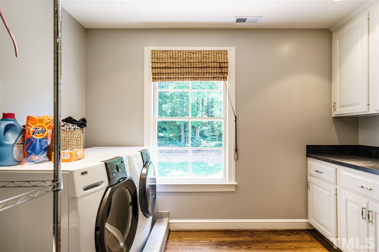 3300 Landor Road Raleigh, NC 27609 - Photo 19 of 25 a view of a storage and utility room with a window