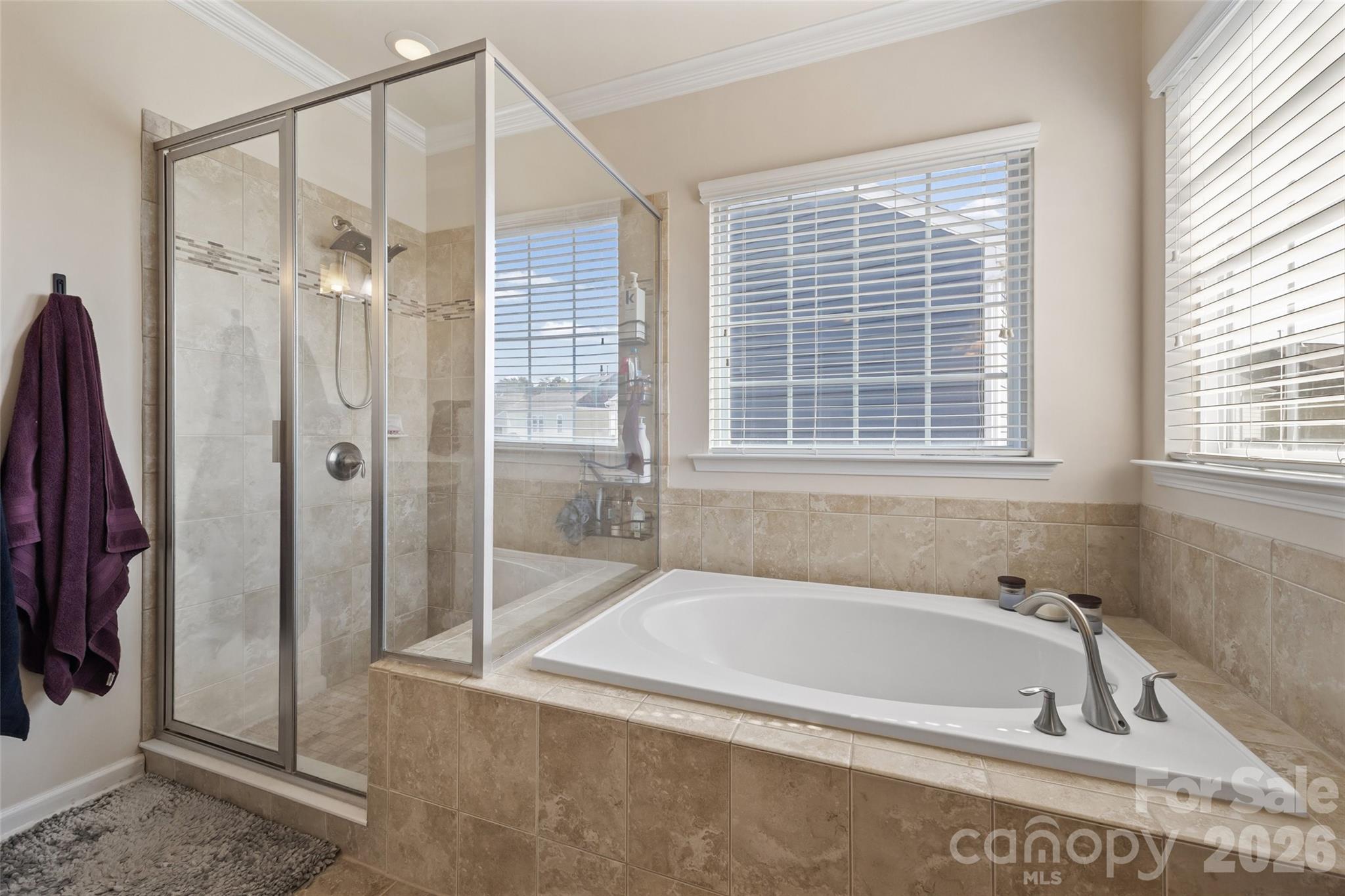 327 Hawks Creek Parkway Fort Mill, SC 29708 - Photo 26 of 48 a bathroom with a tub and a shower
