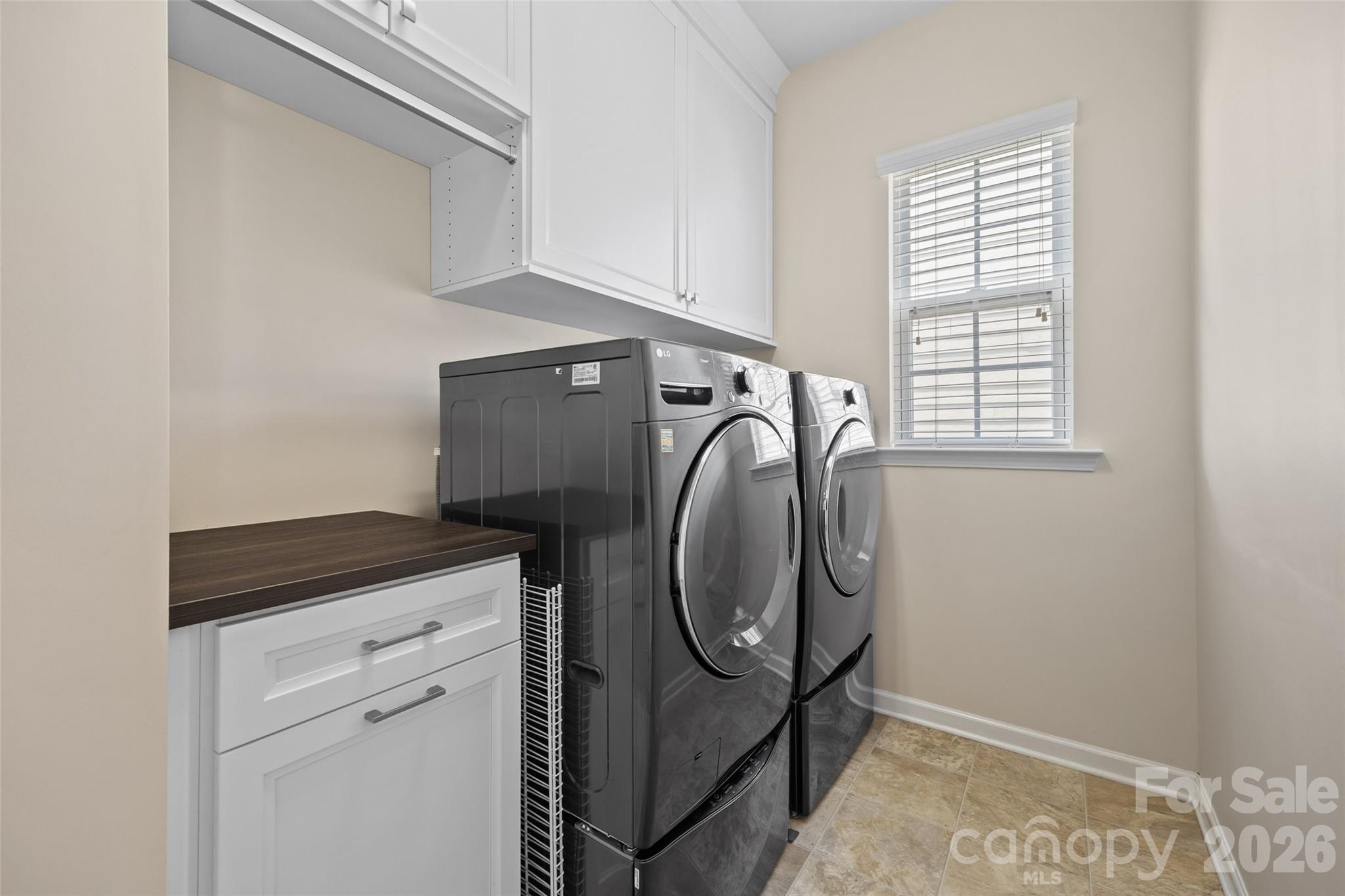 327 Hawks Creek Parkway Fort Mill, SC 29708 - Photo 29 of 48 a utility room with dryer and washer
