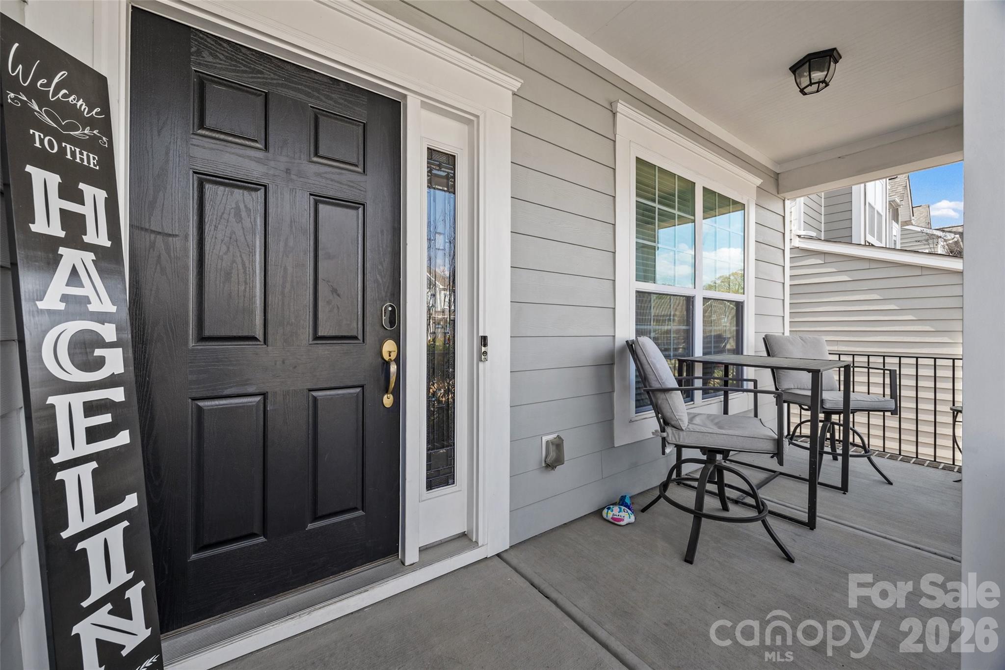 327 Hawks Creek Parkway Fort Mill, SC 29708 - Photo 3 of 48 a view of a hallway with seating area