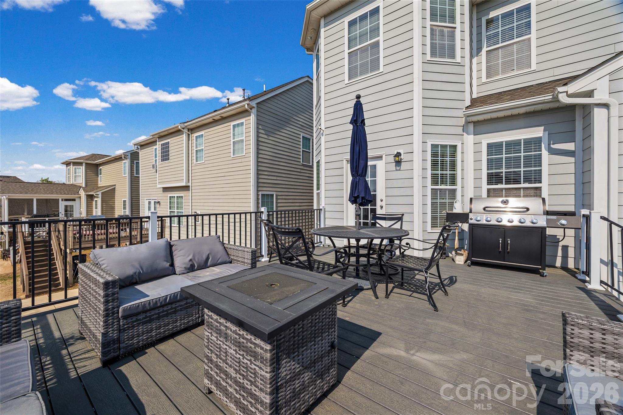 327 Hawks Creek Parkway Fort Mill, SC 29708 - Photo 40 of 48 a roof deck with a couch and chairs