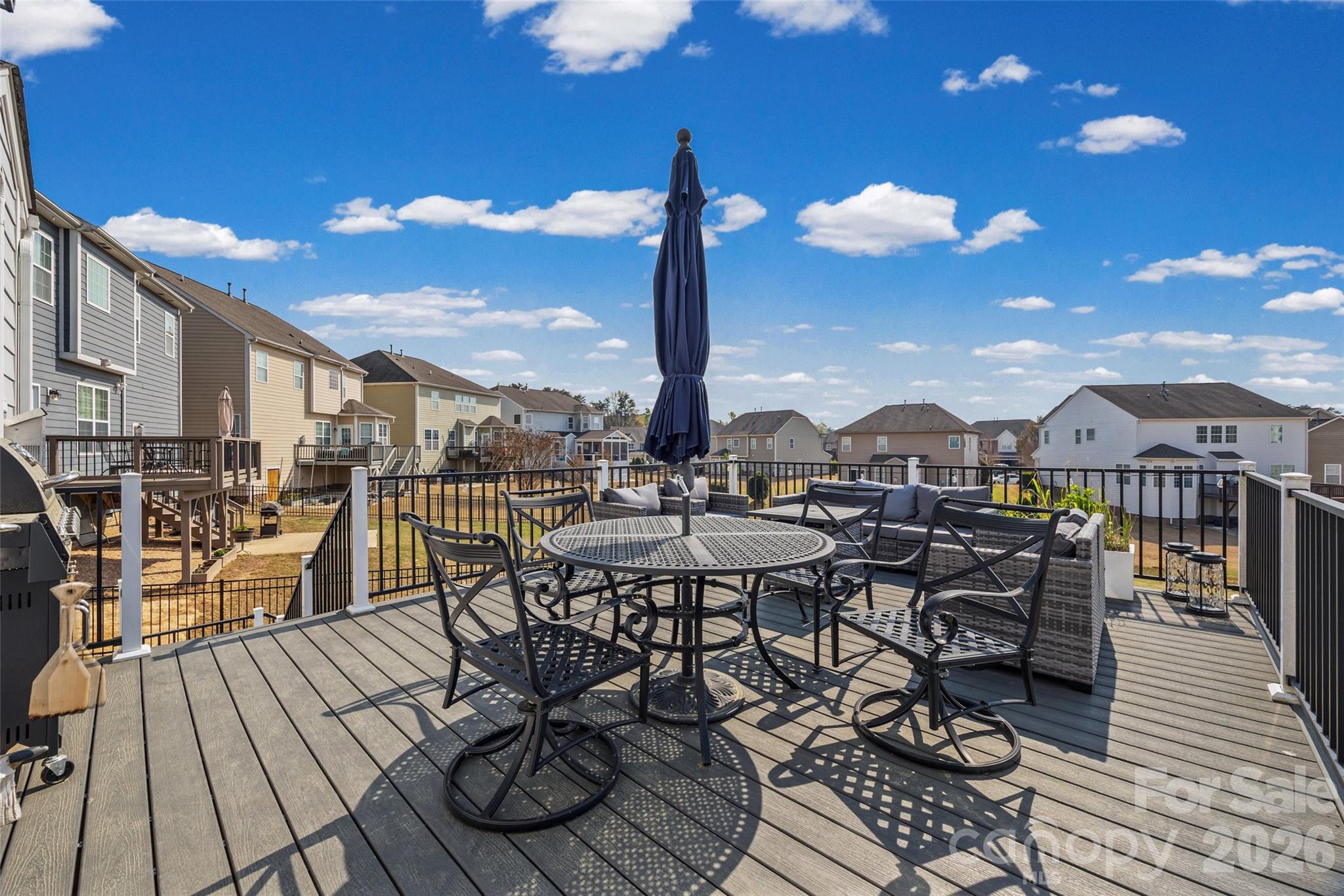 327 Hawks Creek Parkway Fort Mill, SC 29708 - Photo 41 of 48 a view of a patio with table and chairs