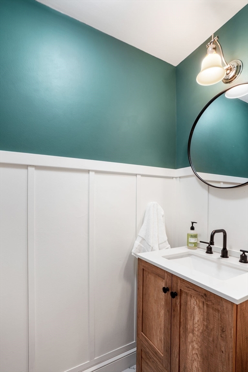 68 Baldwin Street, Unit 1 Boston, MA 02129 - Photo 12 of 19 a bathroom with a sink and mirror