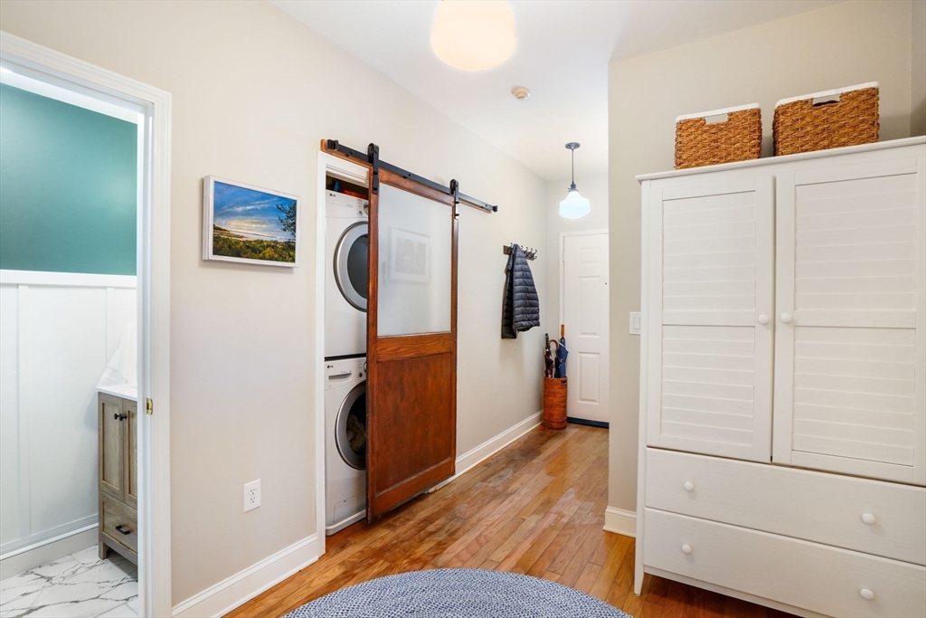 68 Baldwin Street, Unit 1 Boston, MA 02129 - Photo 13 of 19 a view of a storage & utility room with closet and wooden floor
