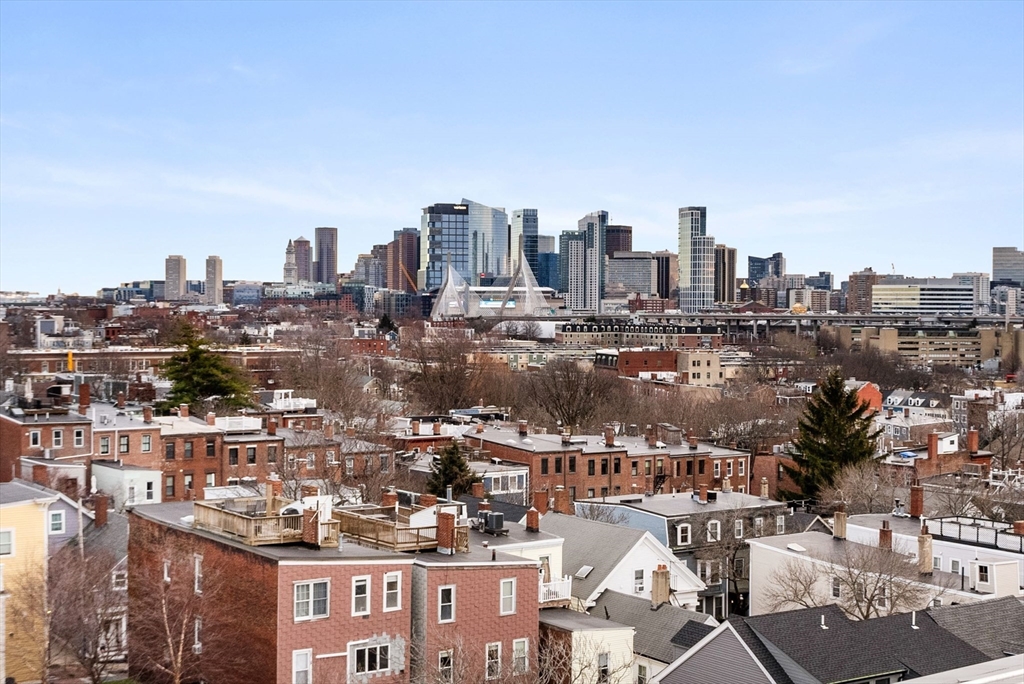 68 Baldwin Street, Unit 1 Boston, MA 02129 - Photo 14 of 19 a city view with tall buildings