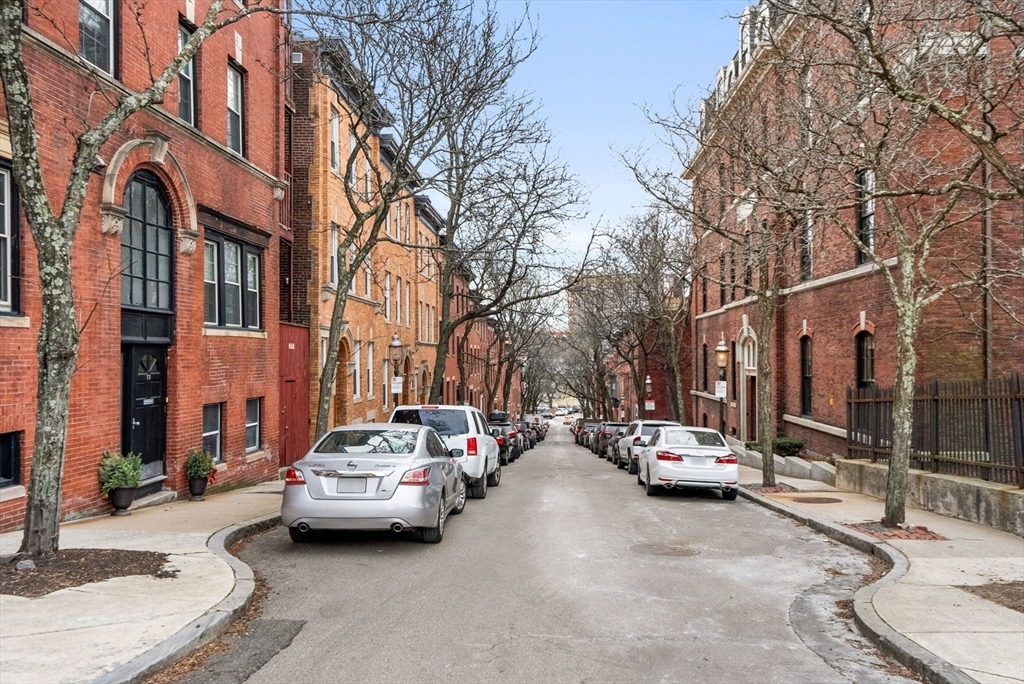 68 Baldwin Street, Unit 1 Boston, MA 02129 - Photo 19 of 19 a car parked on the side of a street