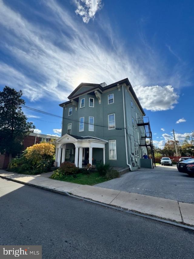 4 West Athens Avenue Ardmore, PA 19003 - Photo 2 of 30 a front view of a house with a garden