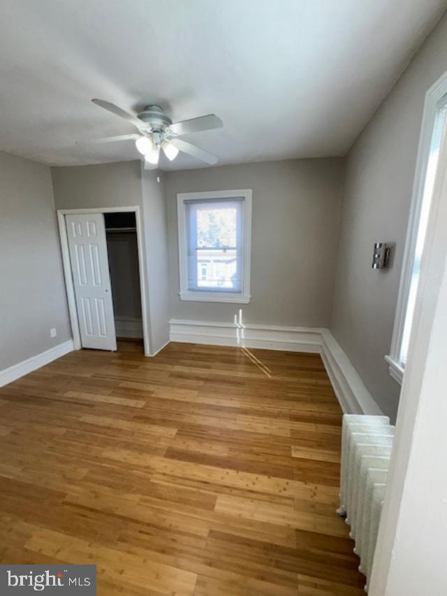 4 West Athens Avenue Ardmore, PA 19003 - Photo 21 of 30 a view of an empty room with wooden floor and a window