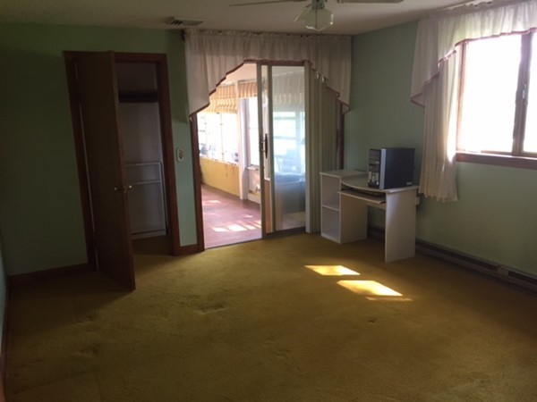 130 Athol Road Orange, MA 01364 - Photo 14 of 20 a view of empty room with windows