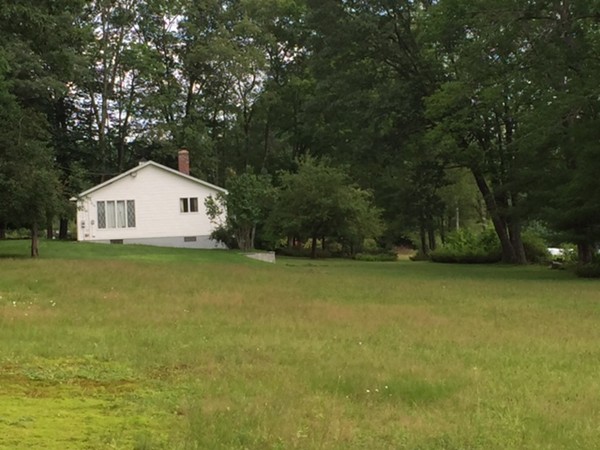 130 Athol Road Orange, MA 01364 - Photo 3 of 20 a view of swimming pool next to a yard with large trees