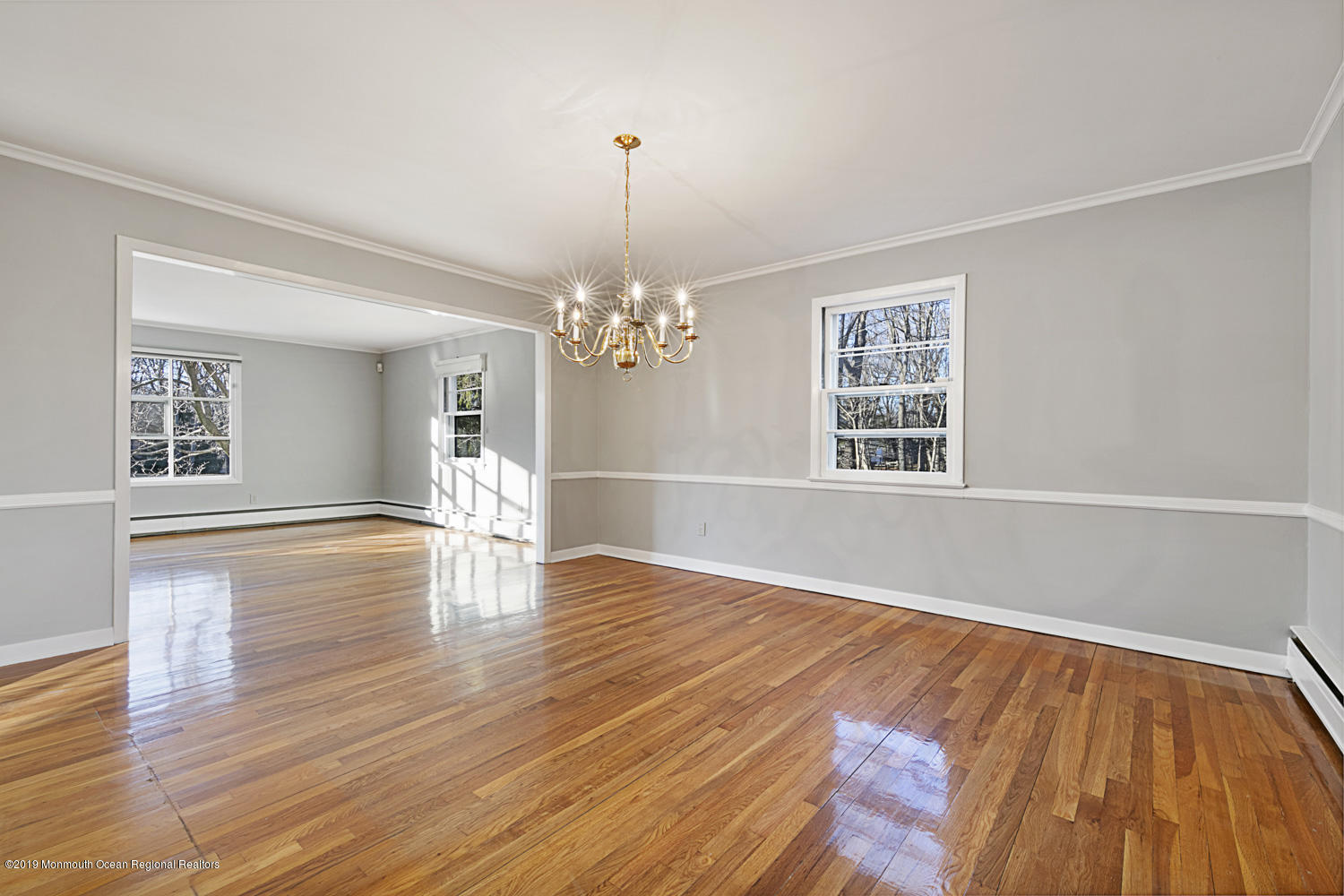 2 Old Farm Road Colts Neck, NJ 07722 - Photo 12 of 56 a view of an empty room with wooden floor and a window