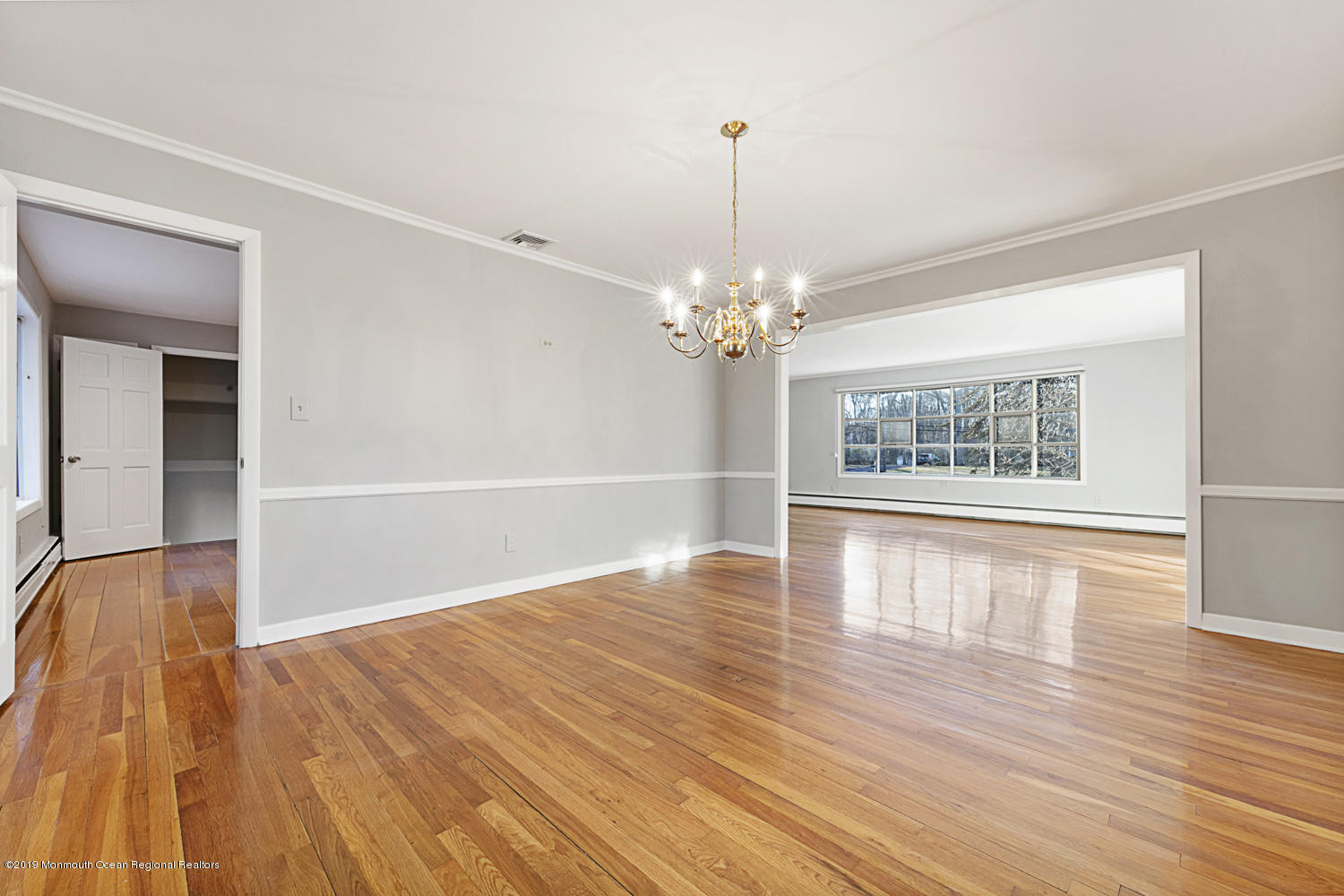 2 Old Farm Road Colts Neck, NJ 07722 - Photo 13 of 56 a view of an empty room with wooden floor and a window