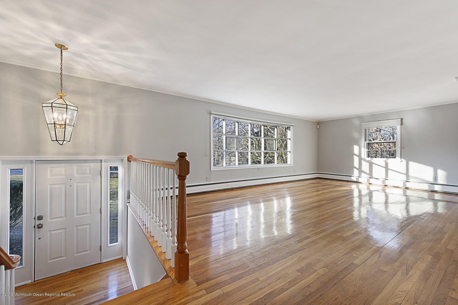 2 Old Farm Road Colts Neck, NJ 07722 - Photo 2 of 56 a view of empty room with wooden floor and fan