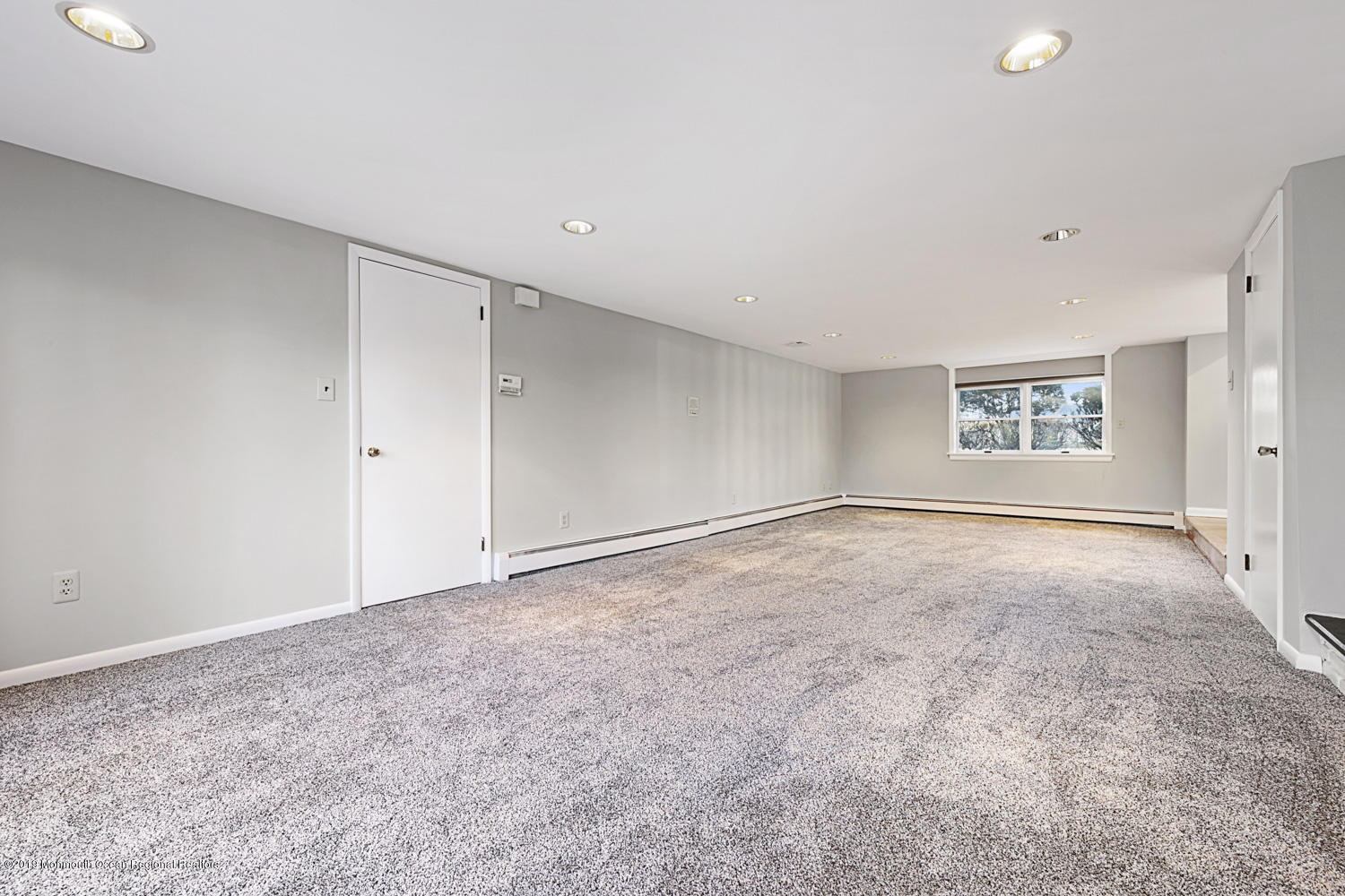 2 Old Farm Road Colts Neck, NJ 07722 - Photo 23 of 56 a view of an empty room with a window