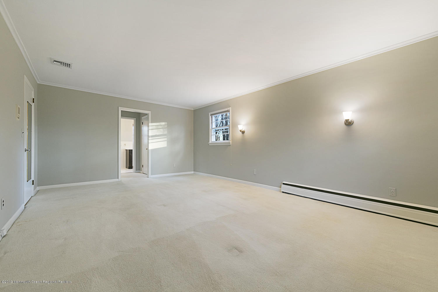 2 Old Farm Road Colts Neck, NJ 07722 - Photo 32 of 56 an empty room with windows and closet