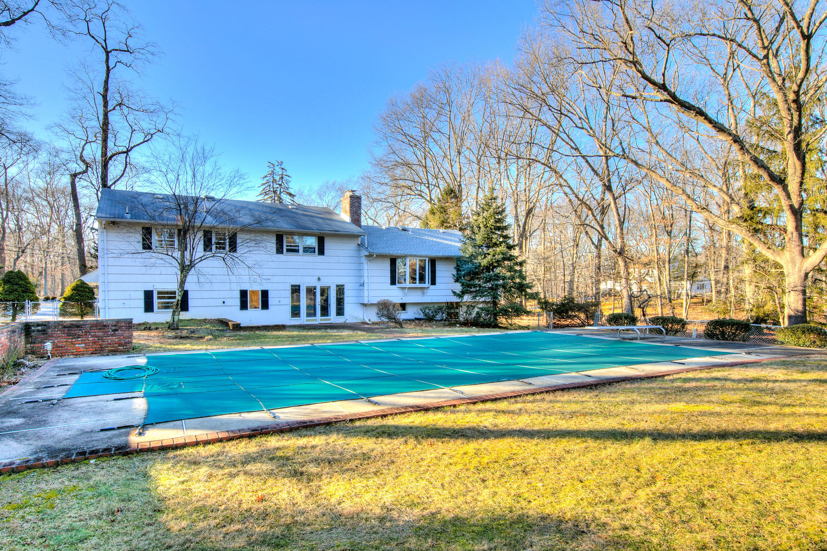 2 Old Farm Road Colts Neck, NJ 07722 - Photo 49 of 56 a front view of a house with a yard