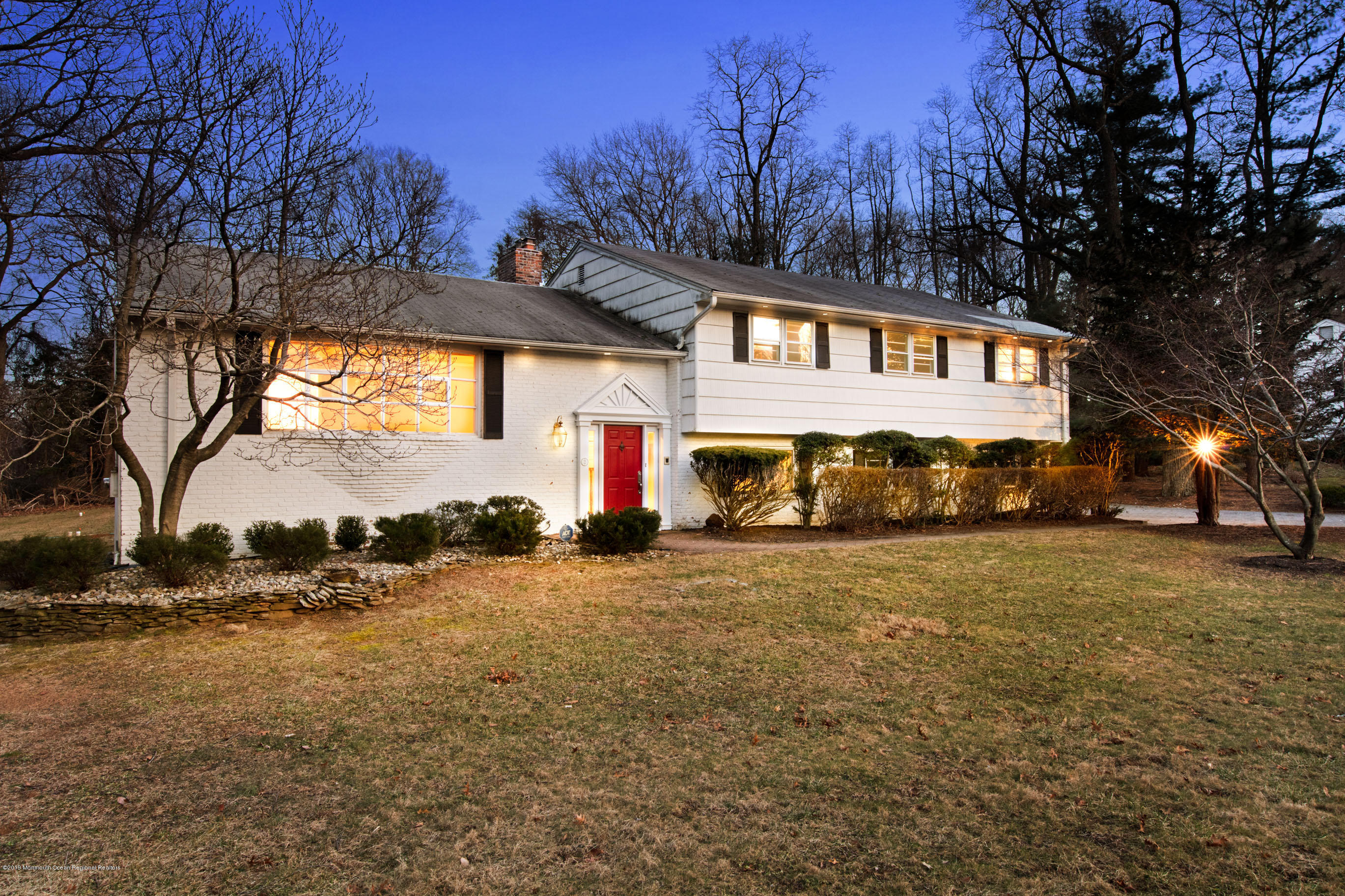 2 Old Farm Road Colts Neck, NJ 07722 - Photo 54 of 56 a front view of a house with a yard