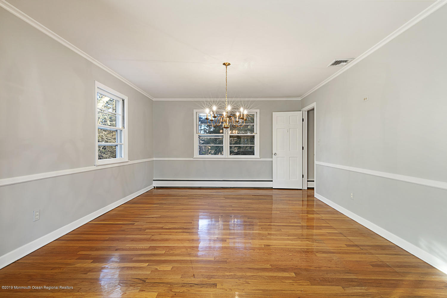 2 Old Farm Road Colts Neck, NJ 07722 - Photo 10 of 56 a view of an empty room with wooden floor and a window