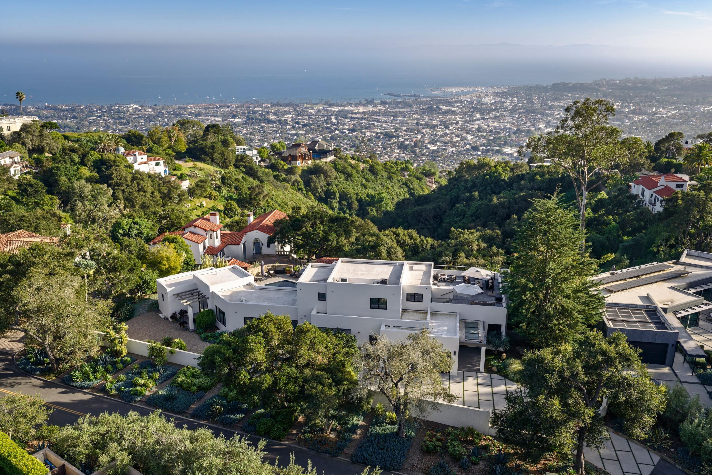 1131 Las Alturas Road, Unit A Santa Barbara, CA 93103 - Photo 45 of 47 44. Aerial at Dusk with Pool and Lit Int