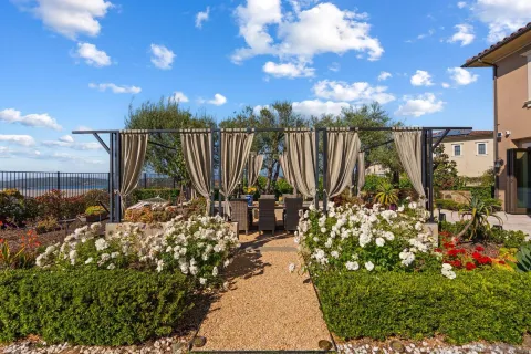 a view of a pathway with a wooden fence