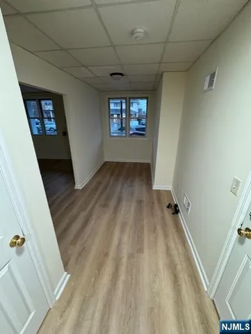 a view of an empty room and window