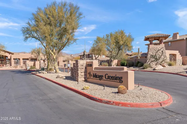 a swimming pool with outdoor seating and yard