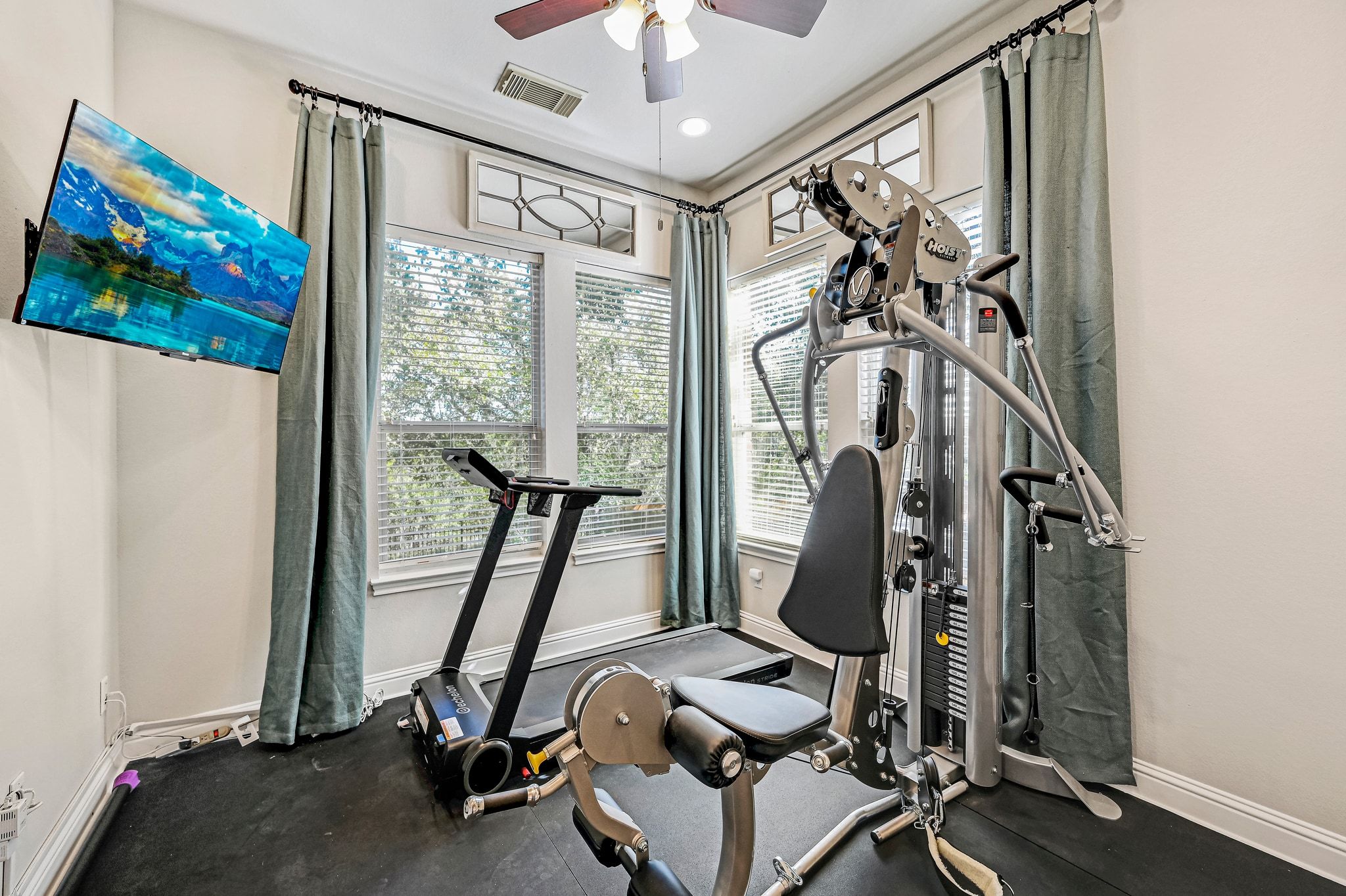 7112 Via Correto Drive Austin, TX 78749 - Photo 14 of 29 Exercise room just off of the primary bathroom, with a scenic view of the greenbelt