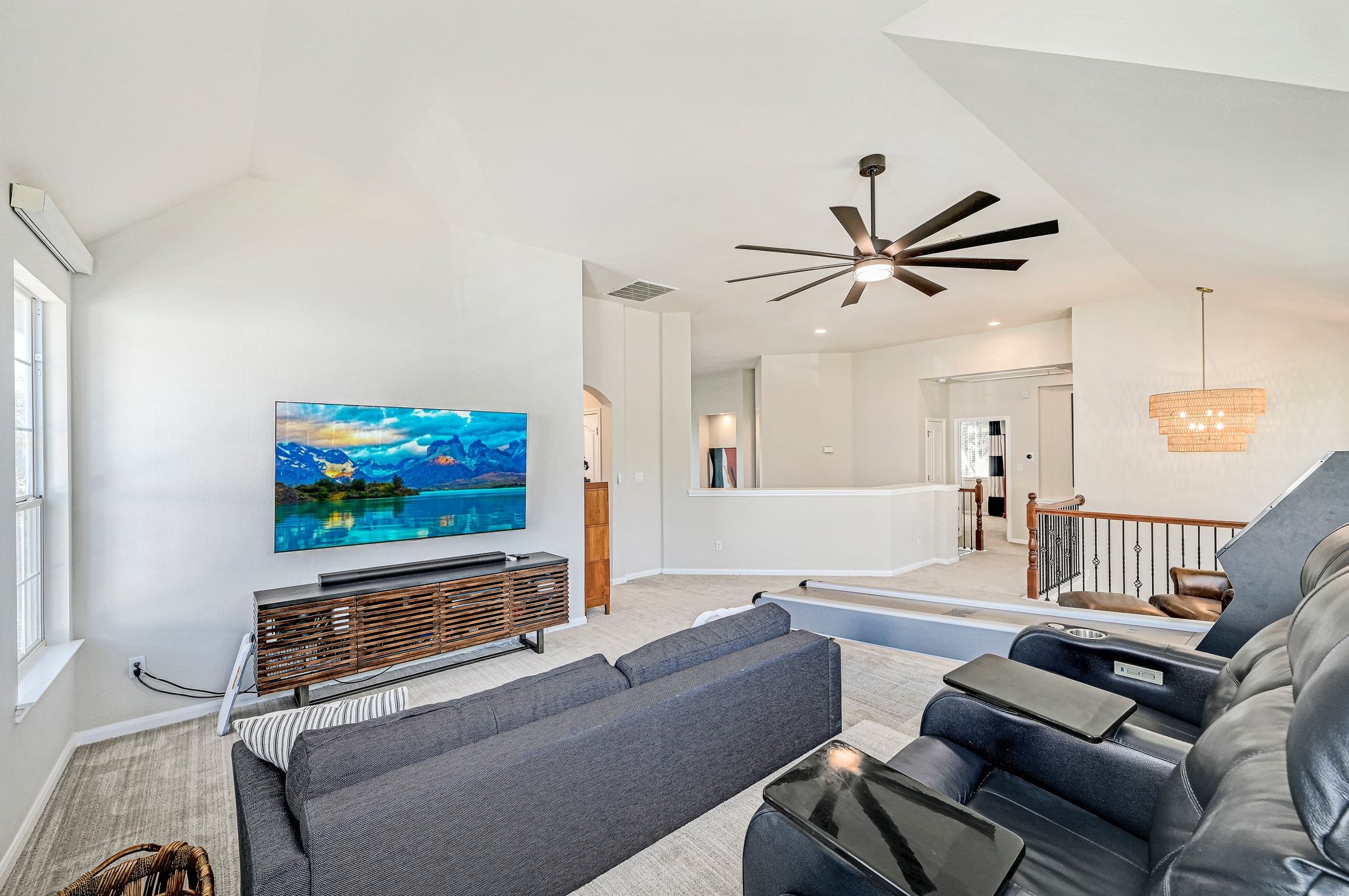 7112 Via Correto Drive Austin, TX 78749 - Photo 16 of 29 Media room at the top of the stairs with motorized blackout window treatments