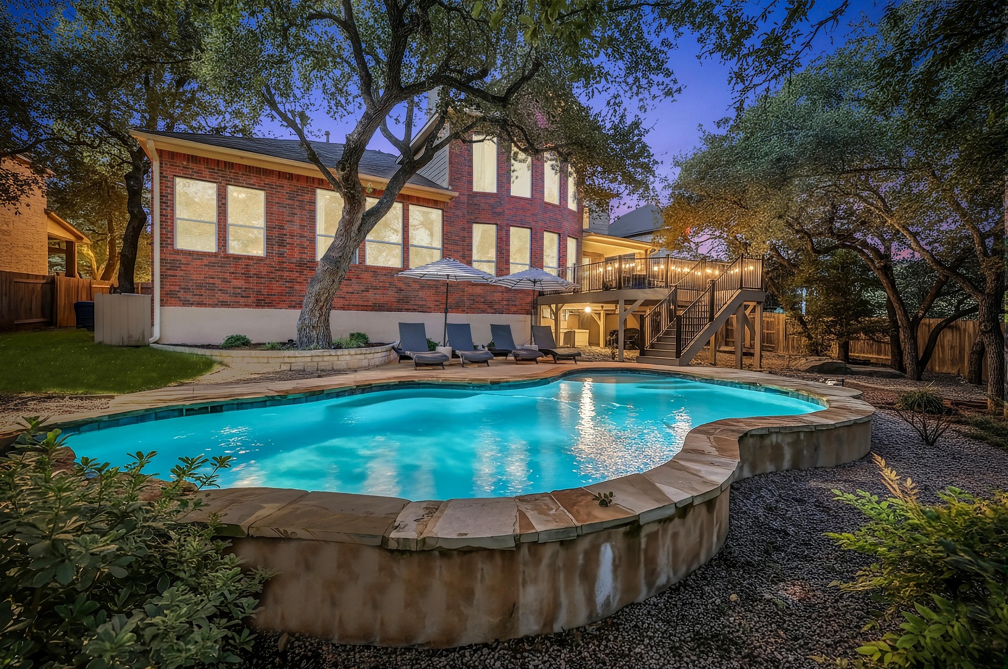 7112 Via Correto Drive Austin, TX 78749 - Photo 21 of 29 View of swimming pool with a fenced backyard, patio surround, and a deck