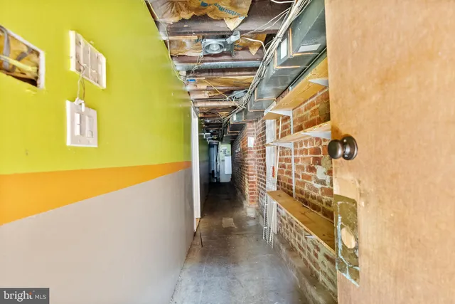 a view of a livingroom with wooden floor