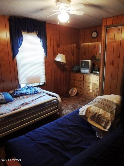 69 Salem Heights Rd Lake Lake Ariel, PA 18436 - Photo 15 of 18 a bedroom with bed and window