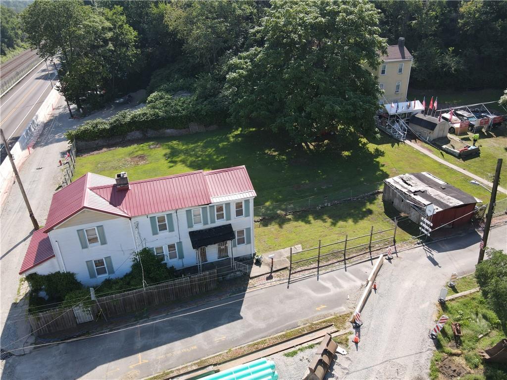 3326 Ruthven Street Pittsburgh, PA 15219 - Photo 3 of 17 an aerial view of a house with garden space and street view