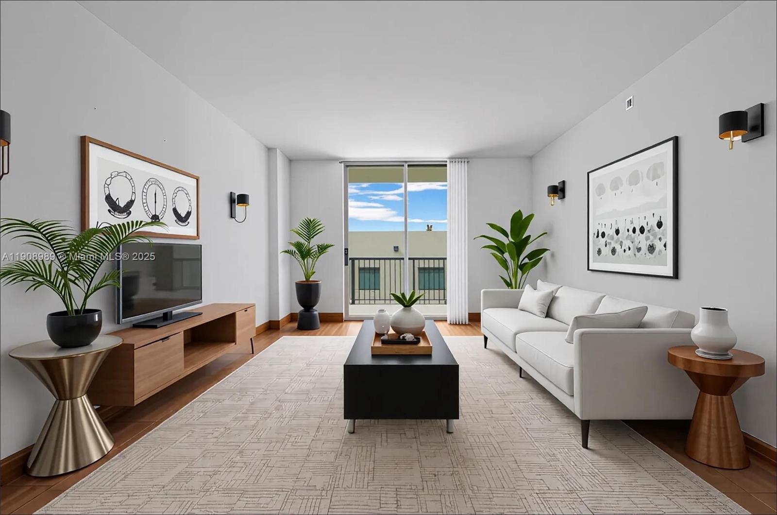 140 South Dixie Highway, Unit 533 Hollywood, FL 33020 - Photo 2 of 17 a living room with furniture a flat screen tv and a potted plant