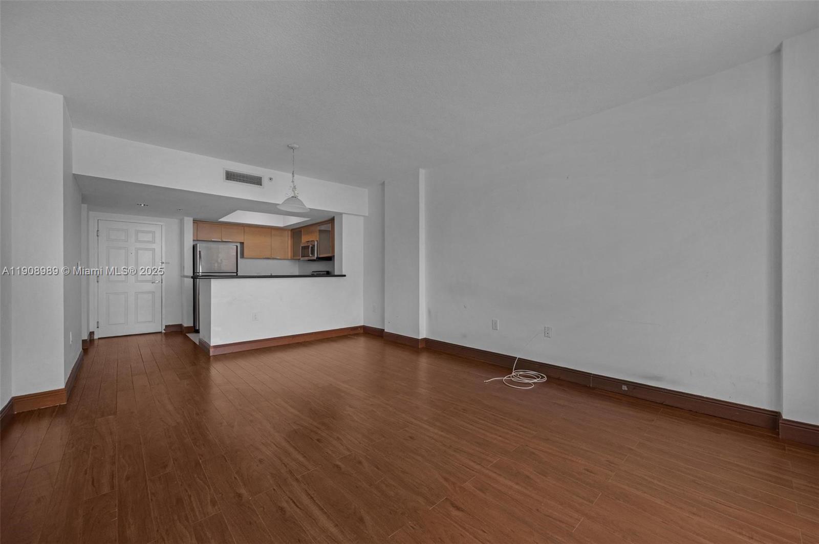 140 South Dixie Highway, Unit 533 Hollywood, FL 33020 - Photo 6 of 17 a view of a room with wooden floor and a sink