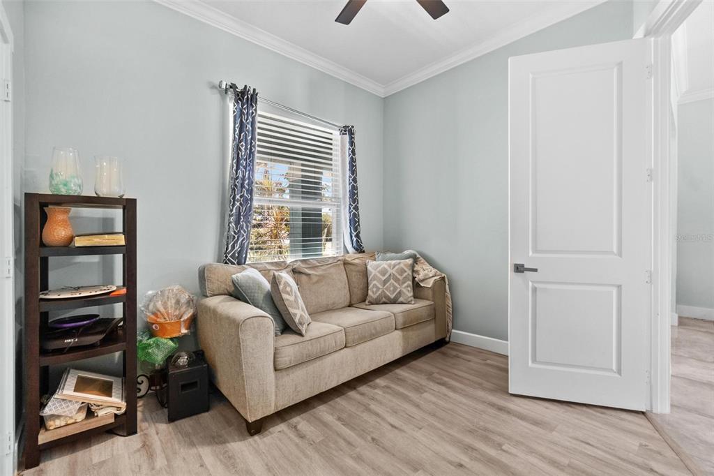 716 Laurel Avenue Venice, FL 34285 - Photo 30 of 42 a living room with furniture and a window