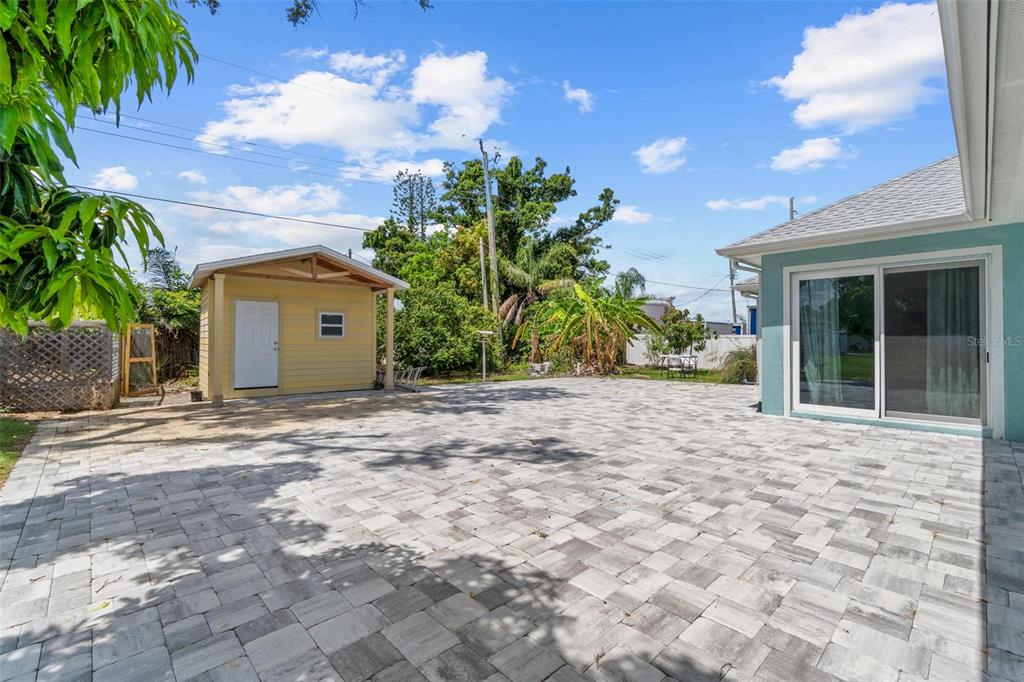 716 Laurel Avenue Venice, FL 34285 - Photo 40 of 42 a view of a house with a yard and potted plants
